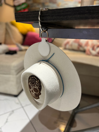 Magnetic hat holder